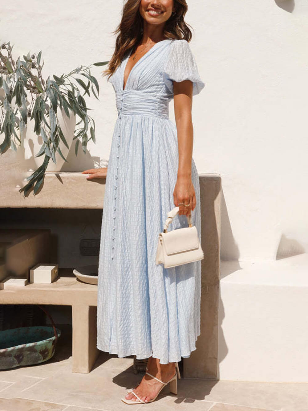 Vestido comprido oversized com mangas de balão e decote em V