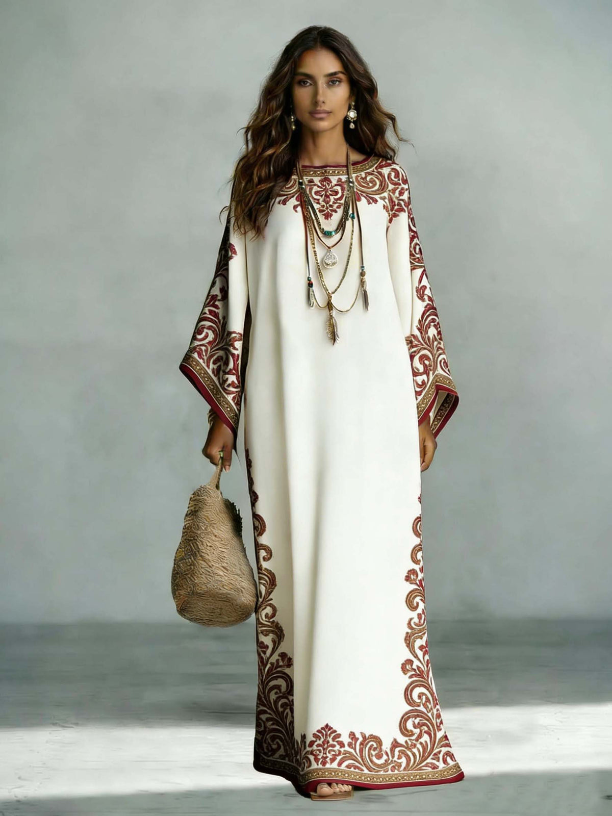 Elegante abito lungo boho in raso con stampa floreale e maniche a pipistrello