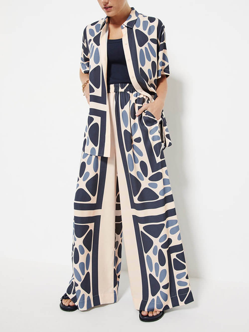 Pantalones holgados con cintura elástica y estampado étnico único, de estilo vacacional veraniego