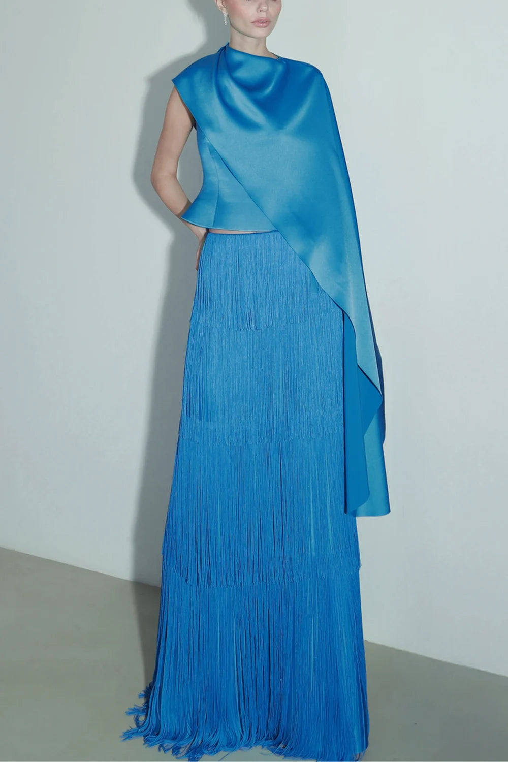 One Shoulder Cape Top and Tiered Fringe Maxi Skirt Two Piece Set