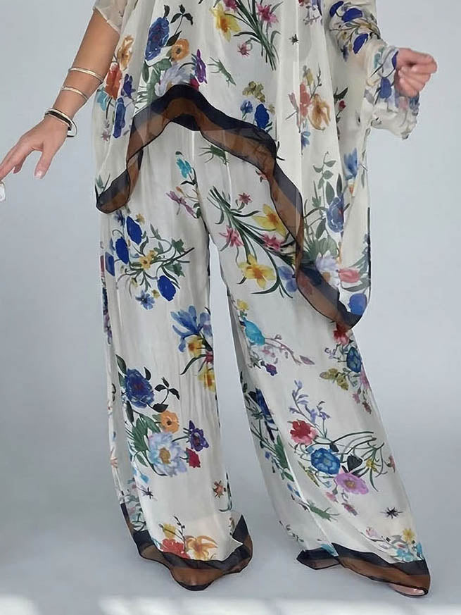 Ensemble élégant à imprimé floral et tissu transparent, composé d’un haut asymétrique à une épaule et d’un pantalon à jambes larges