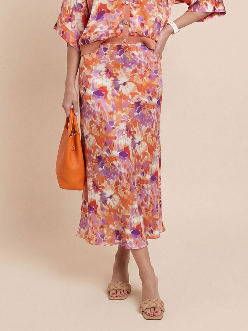 Gonna midi in raso elegante a vita alta con stampa floreale raffinata