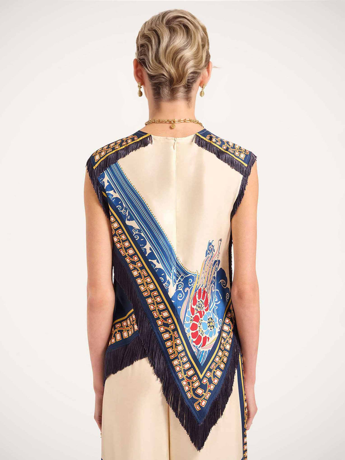 Conjunto bohemio elegante de dos piezas con chaleco estampado y borlas