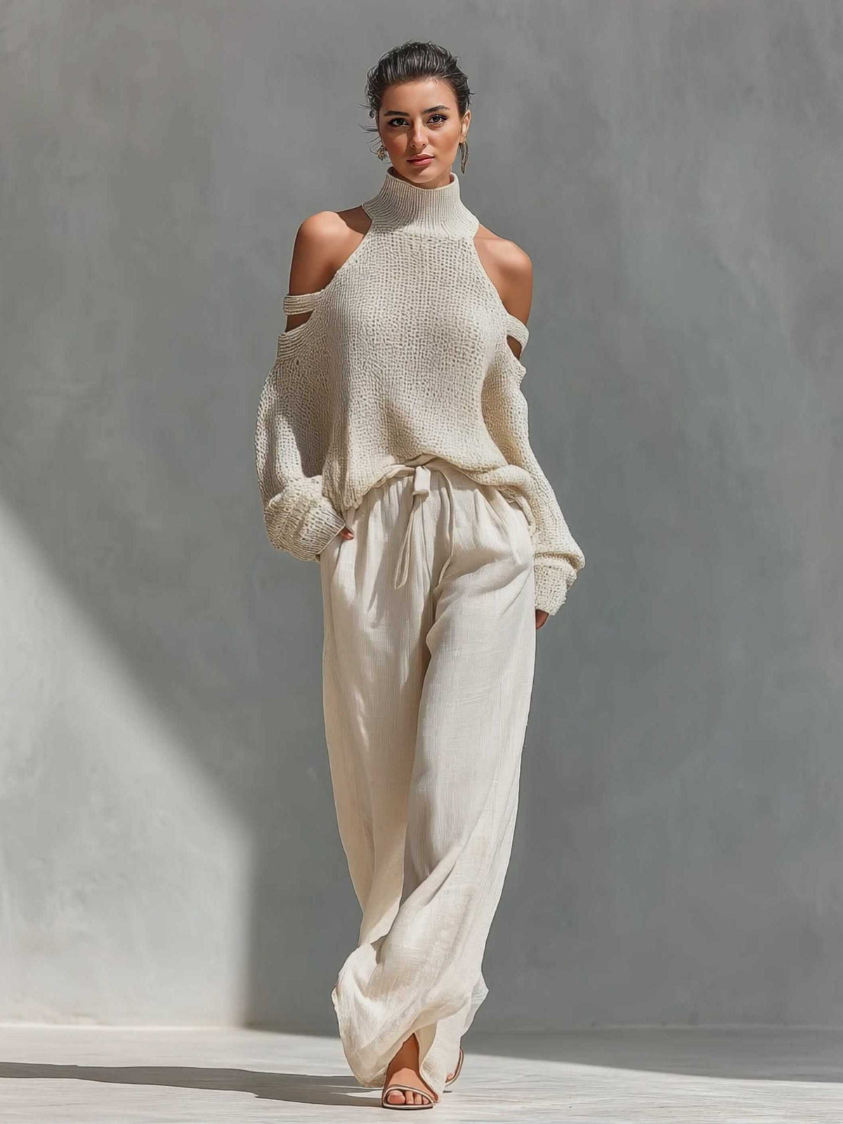 Lässiges zweiteiliges Set aus schulterfreiem Stricktop und Hose mit weitem Bein