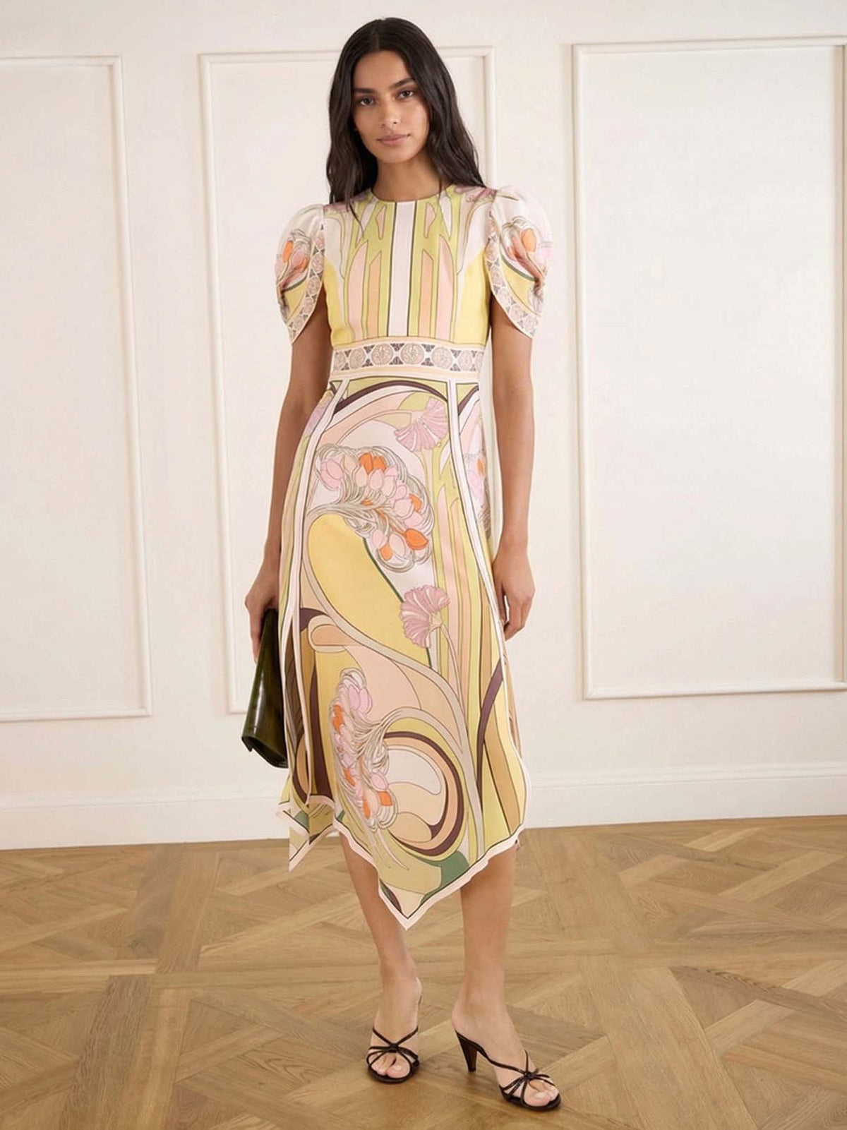 Vestido midi elegante de estilo vintage con estampado floral, mangas abullonadas y bajo asimétrico