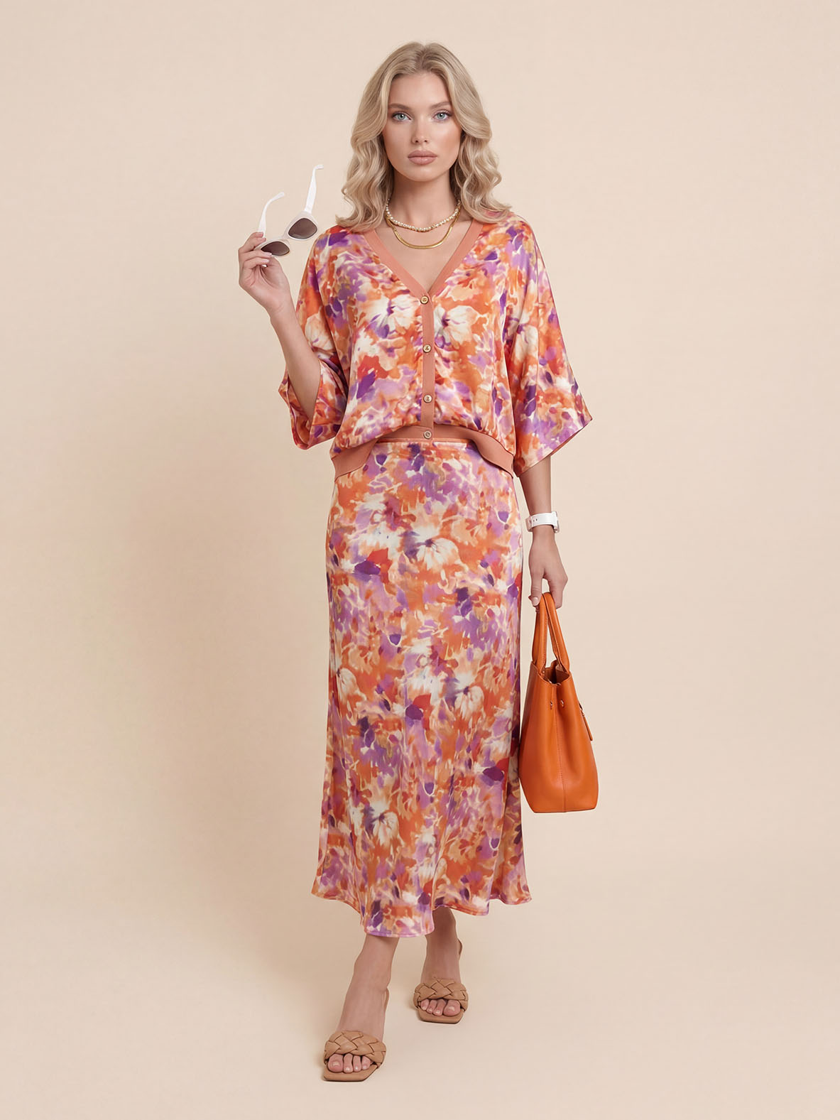 Gonna midi in raso elegante a vita alta con stampa floreale raffinata