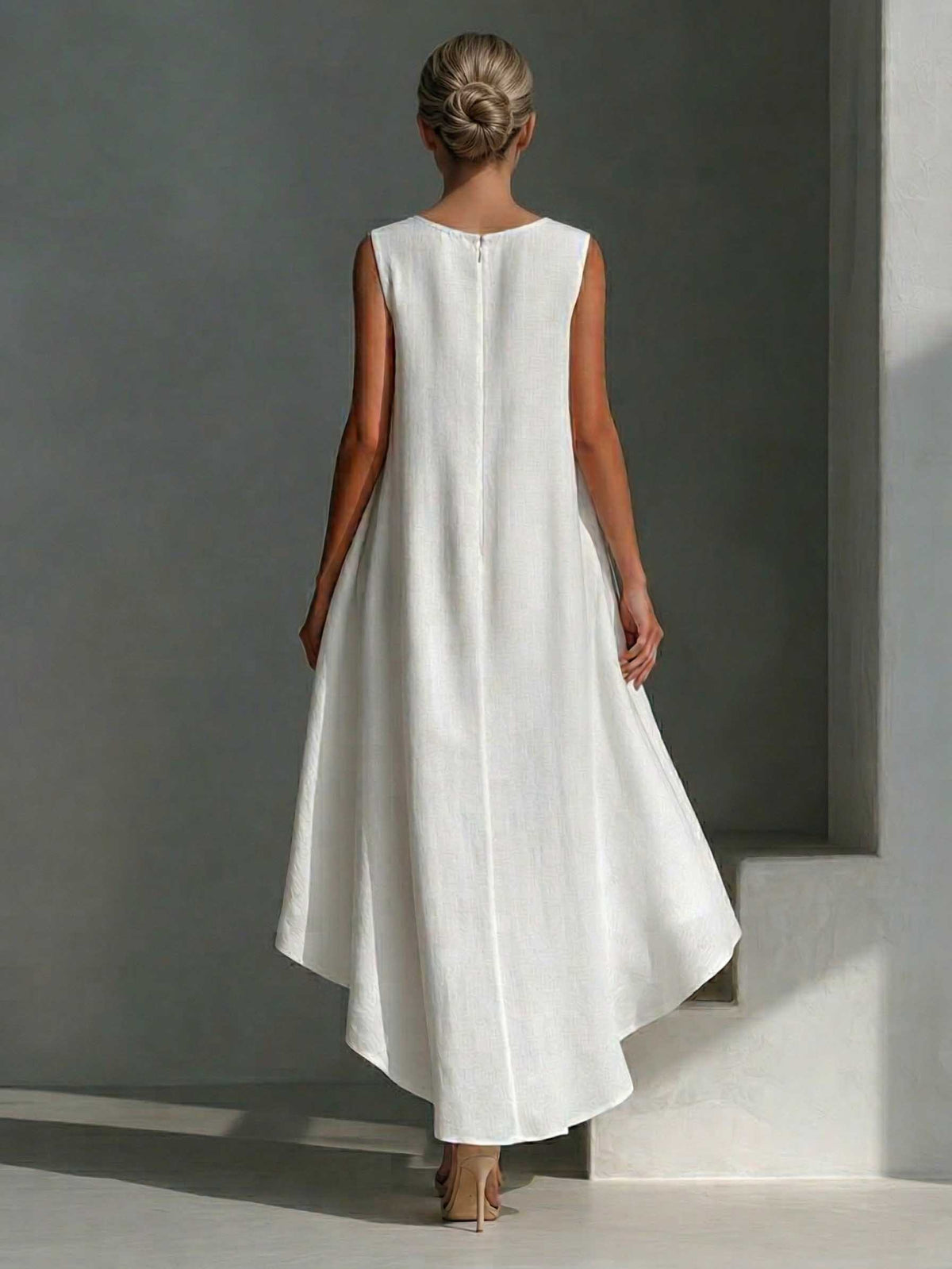 Vestido midi informal sin mangas con bajo asimétrico