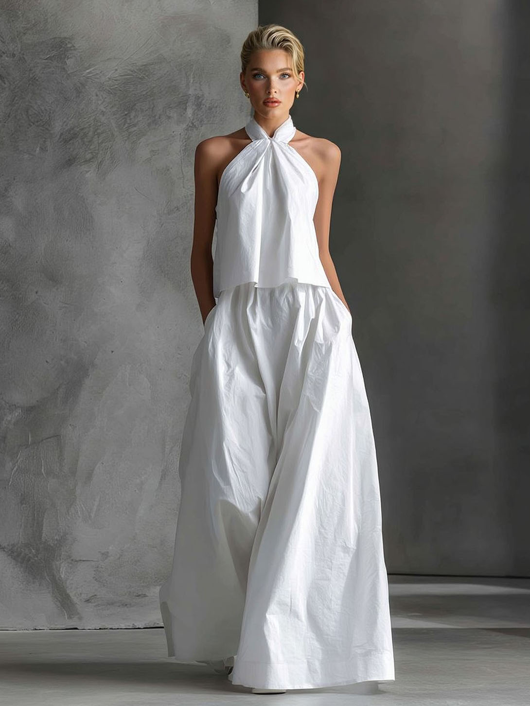 Elegantes zweiteiliges Set aus Neckholder-Top und Hose mit weitem Bein