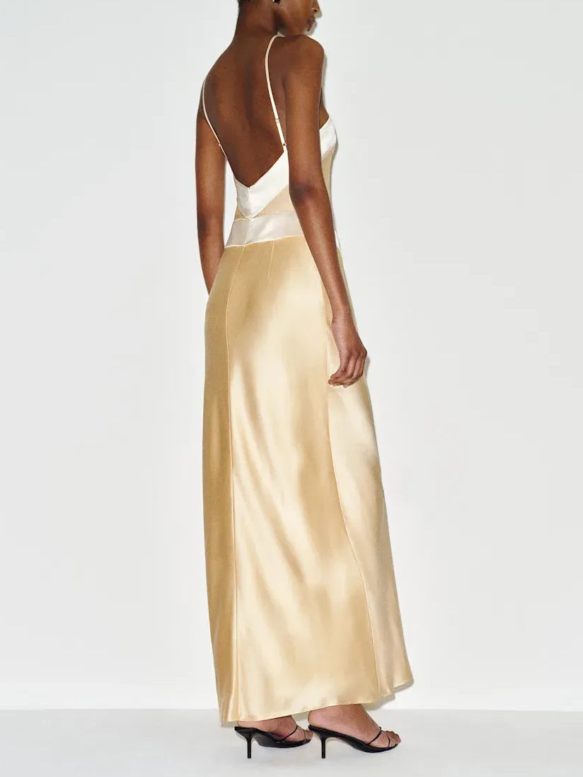 Elegante vestido largo de satén con cuello halter y bloques de color