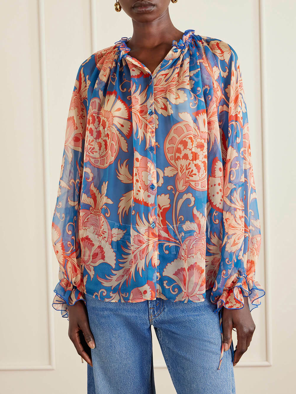 Moderna blusa in chiffon stampato con volant