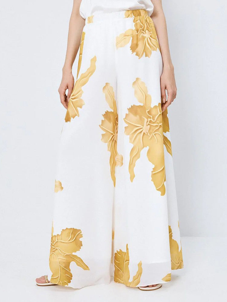 Conjunto elegante de dos piezas con estampado floral dorado