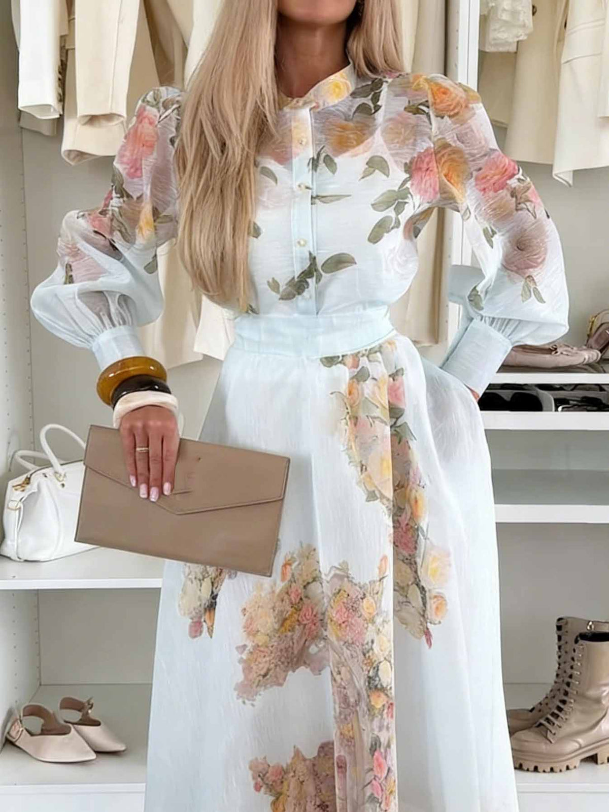 Blusa elegante trasparente a maniche lunghe con stampa floreale