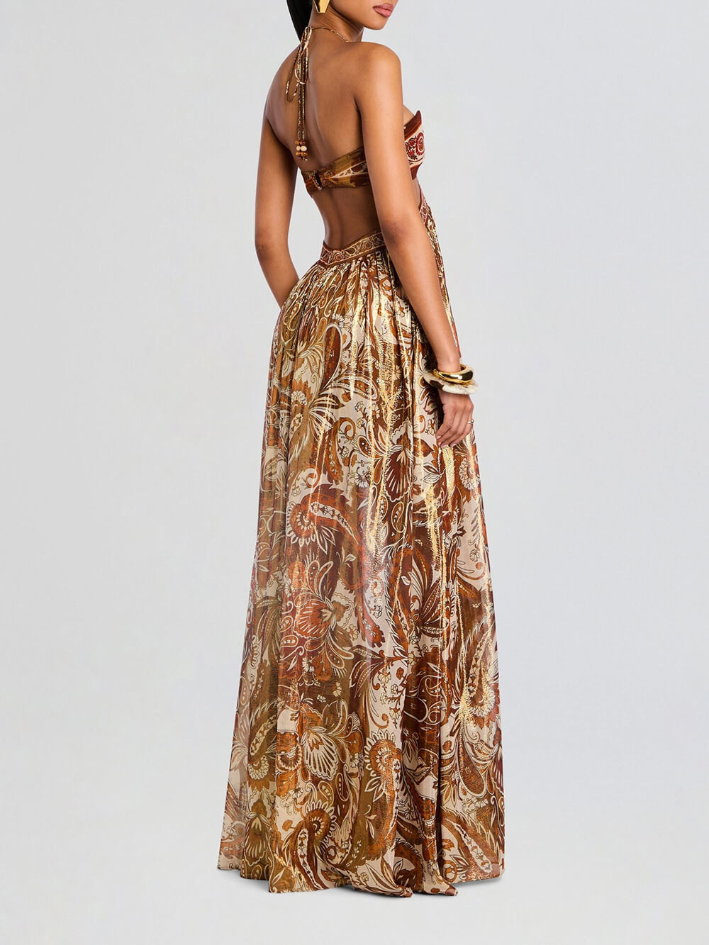 Robe longue élégante dos nu à col licou et imprimé ajouré