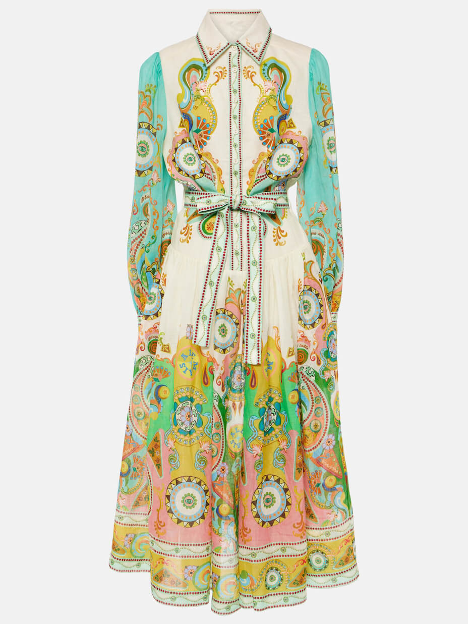 Vestido midi exclusivo e requintado, com estampado moderno, mangas abalonadas e laço