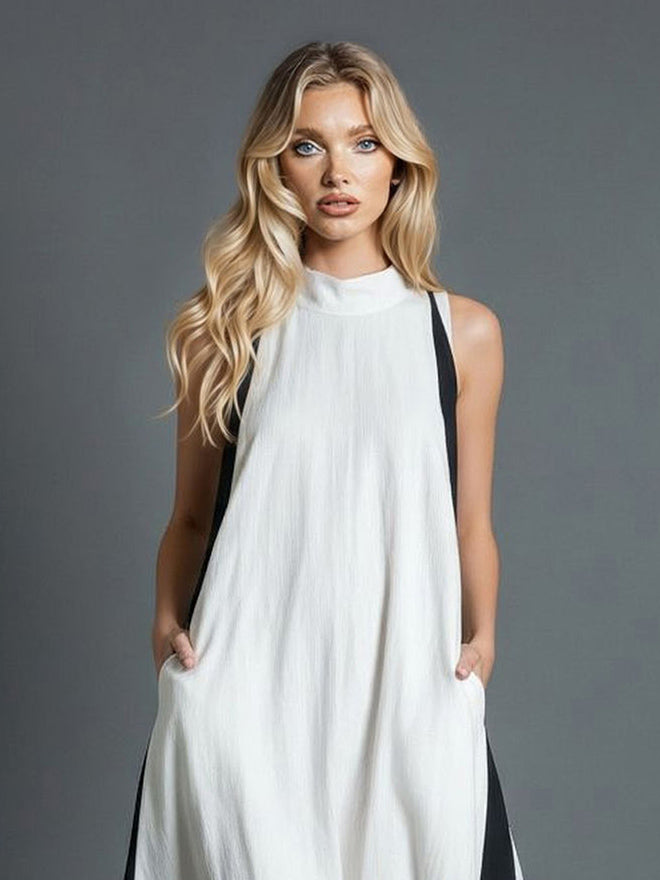 Abito lungo minimalista a blocchi di colore con collo alto