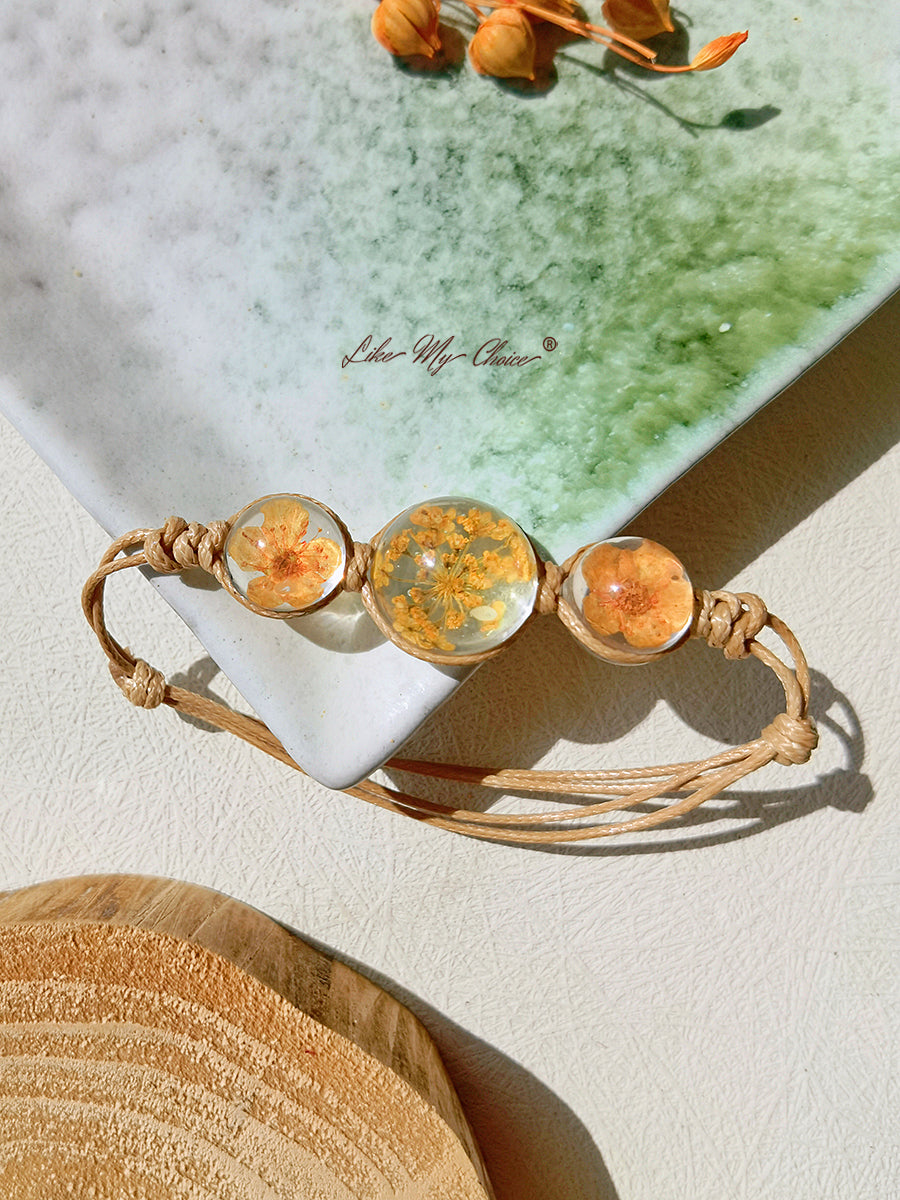 Bracelet jonc à charms en forme de pierres précieuses et de fleurs de cerisier, avec cordon réglable