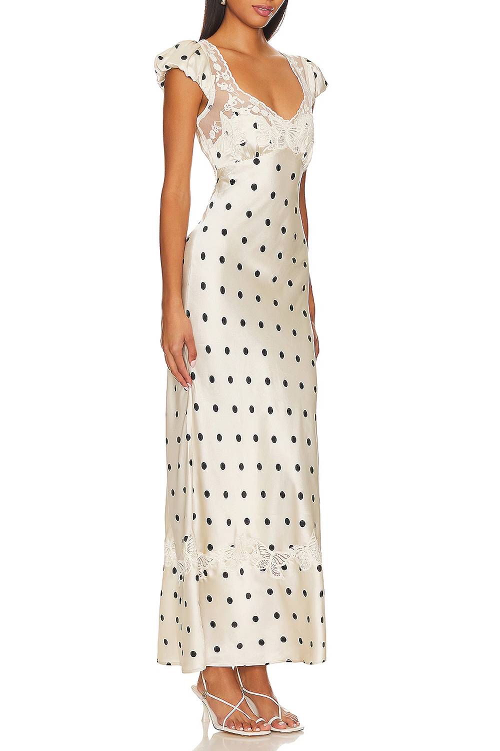 Vestido com decote em V, aplicações de renda, mangas balão e padrão de bolinhas