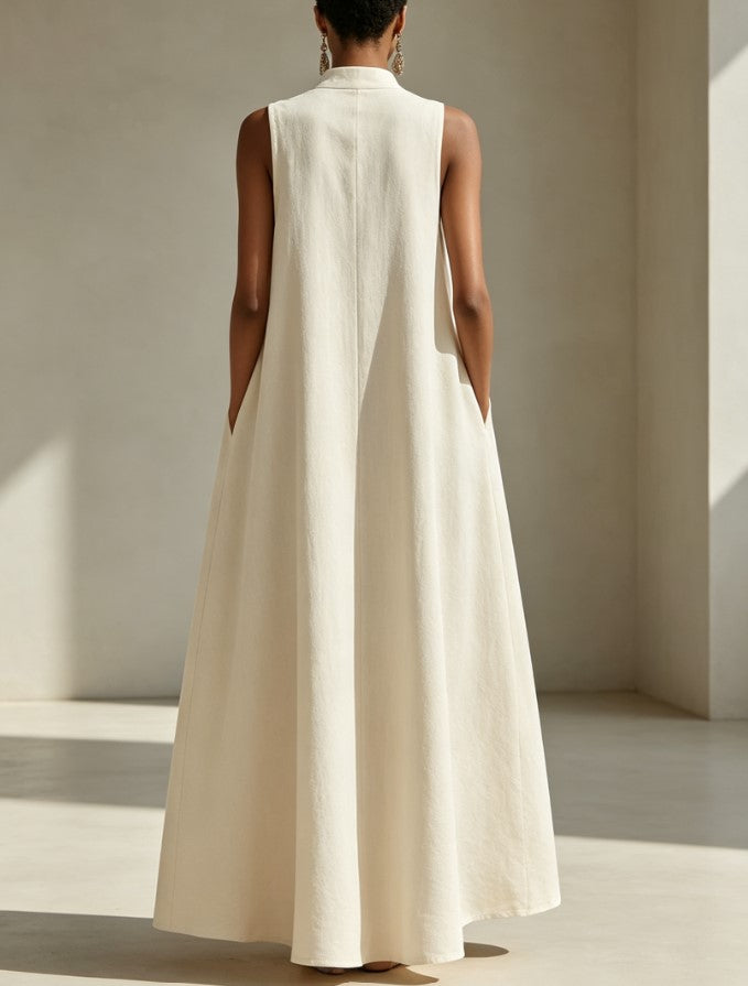 Vestido largo holgado de lino sin mangas, con cuello mao y abertura