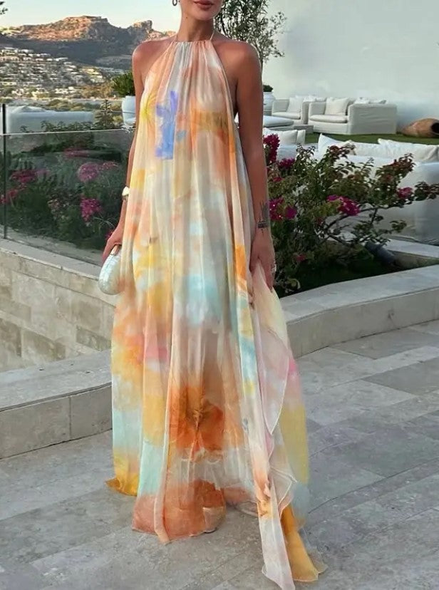 Vestido comprido fluido de chiffon com decote halter e efeito tie-dye