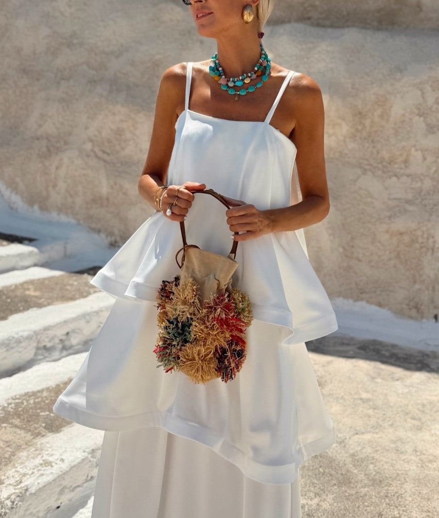 Top a balze con spalline sottili e pantaloni a gamba ampia, completo a due pezzi da vacanza