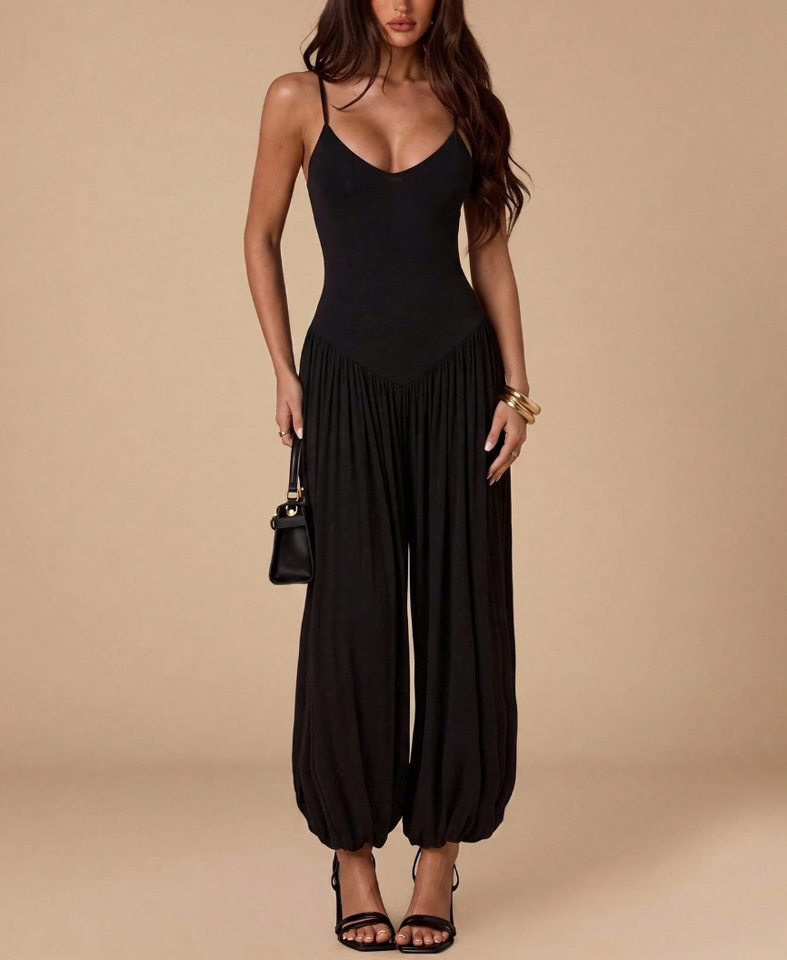 Minimalist Black Spaghetti Strap Jumpsuit with V-Neck Bodice & Pleated Balloon Pants – Effortless Chic Evening Romper