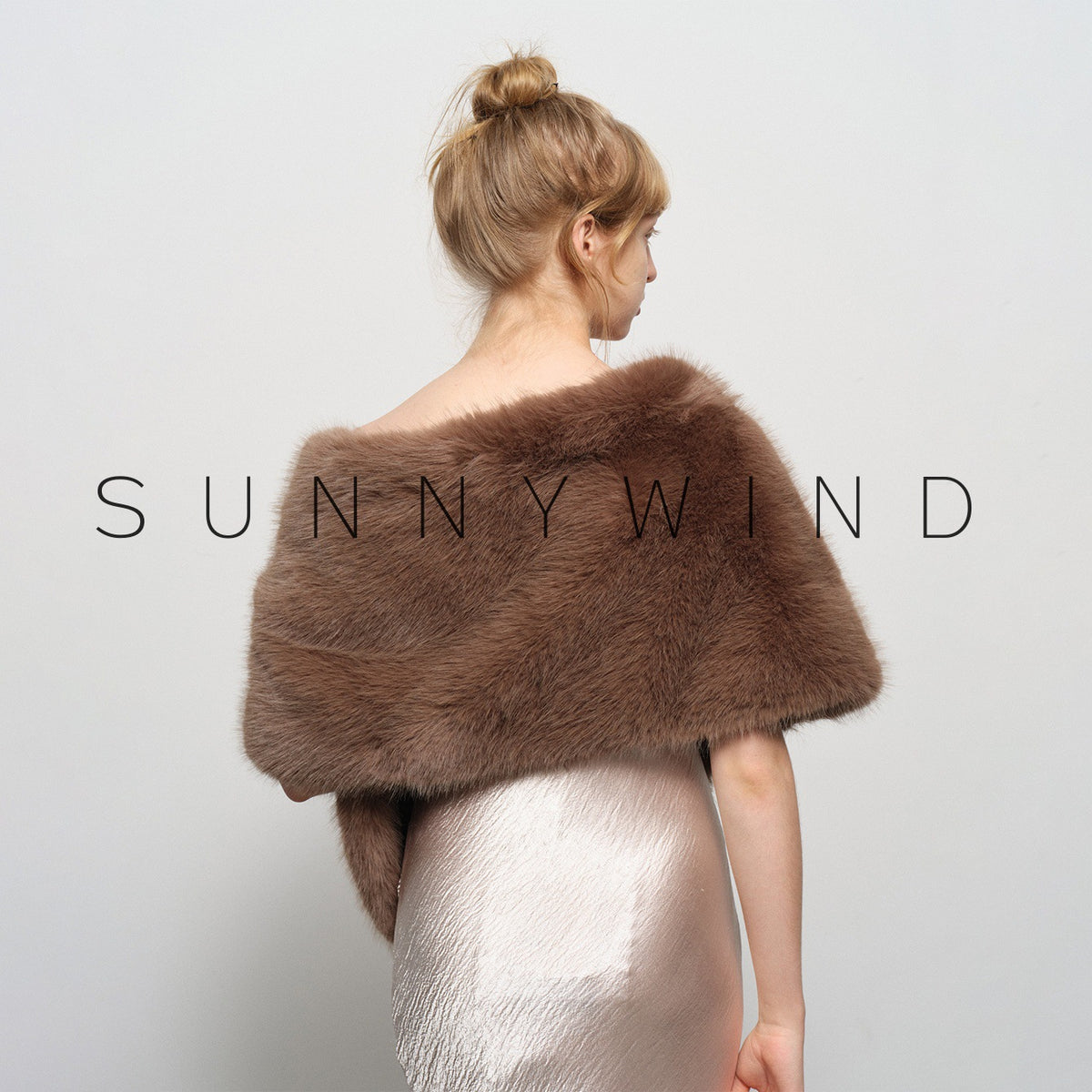 Stylish and elegant faux fur-collared shawl for evening party gowns.