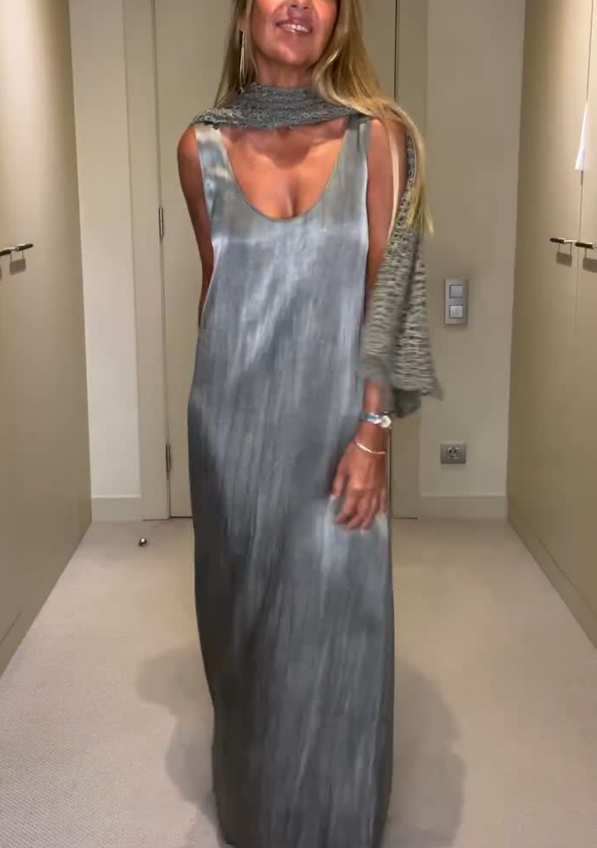 Vestido largo plisado con capa superpuesta de punto calado