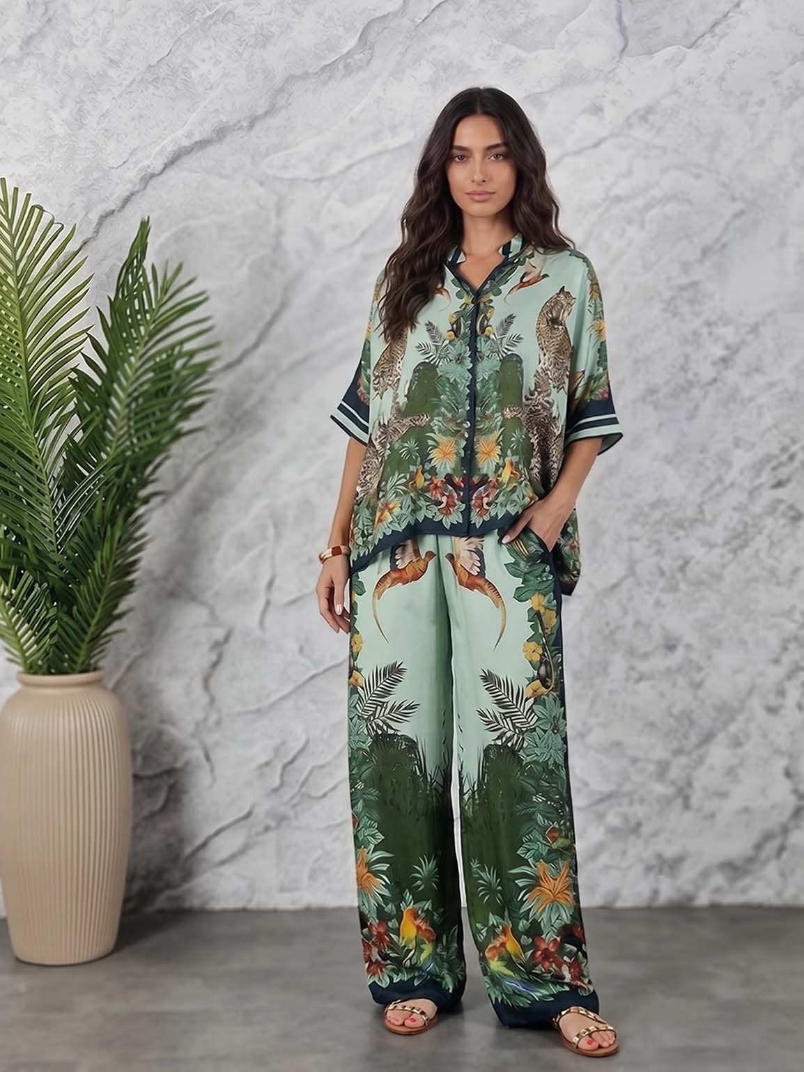 Calças de perna larga com estampado de selva exótica