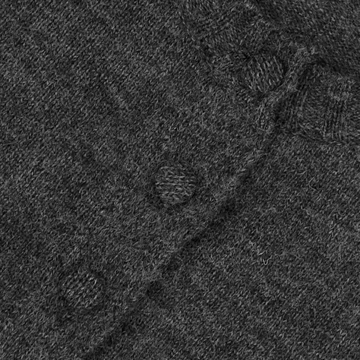 Two-piece set: fitted knit cardigan and knit mini skirt