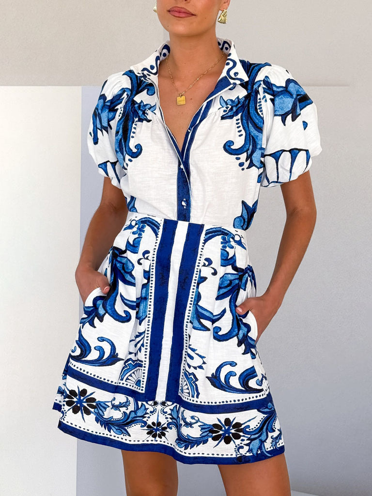 Camisa holgada exquisita con estampado floral artístico y mangas abullonadas