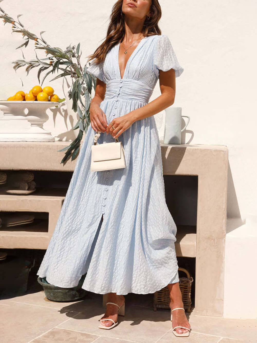 Vestido comprido oversized com mangas de balão e decote em V