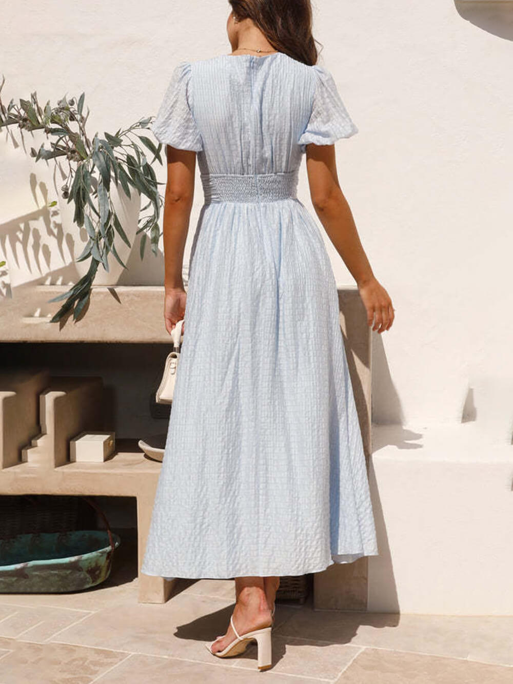 Vestido comprido oversized com mangas de balão e decote em V