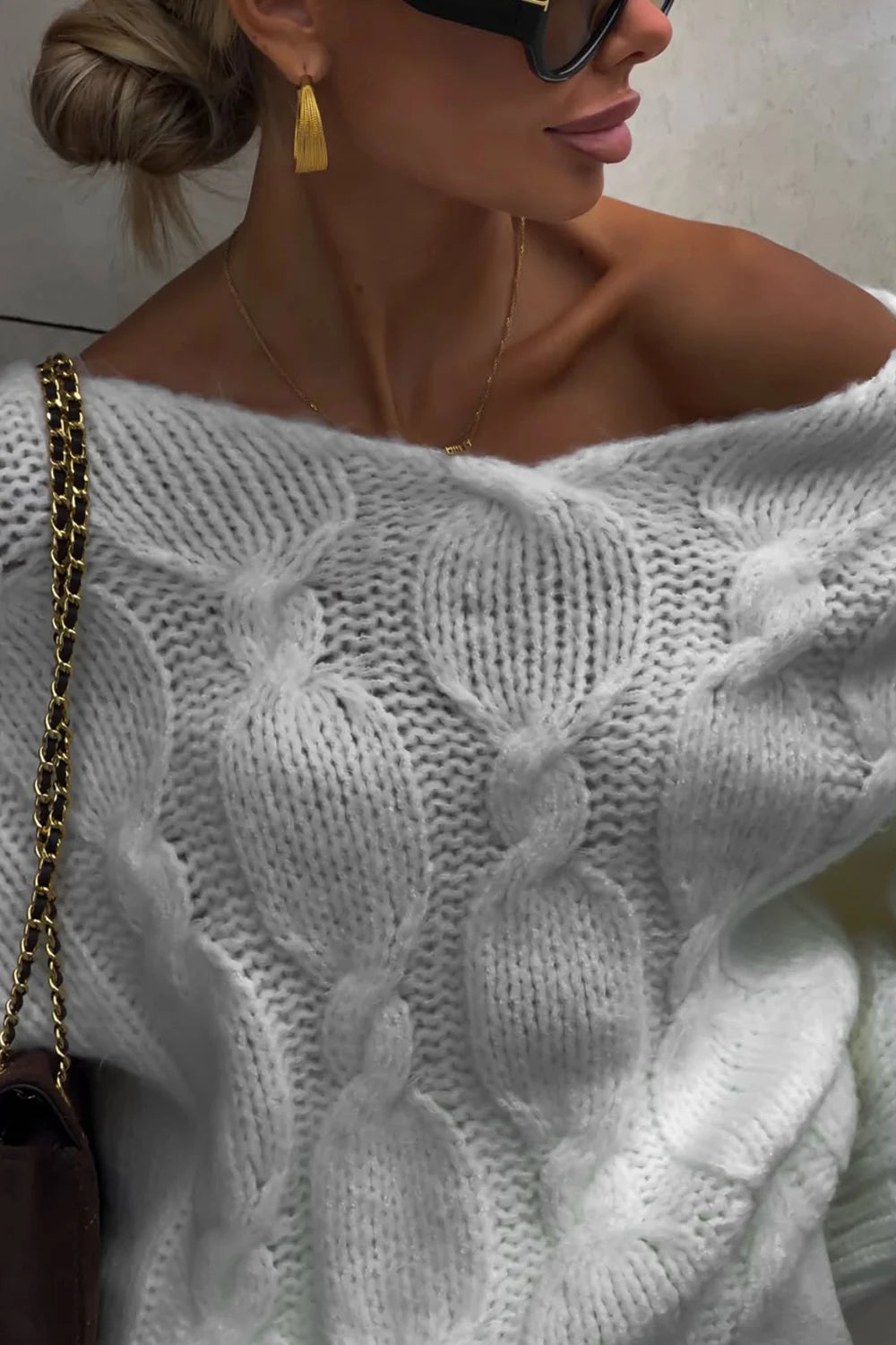 Camisola larga de malha entrançada, com decote em V, para mulher