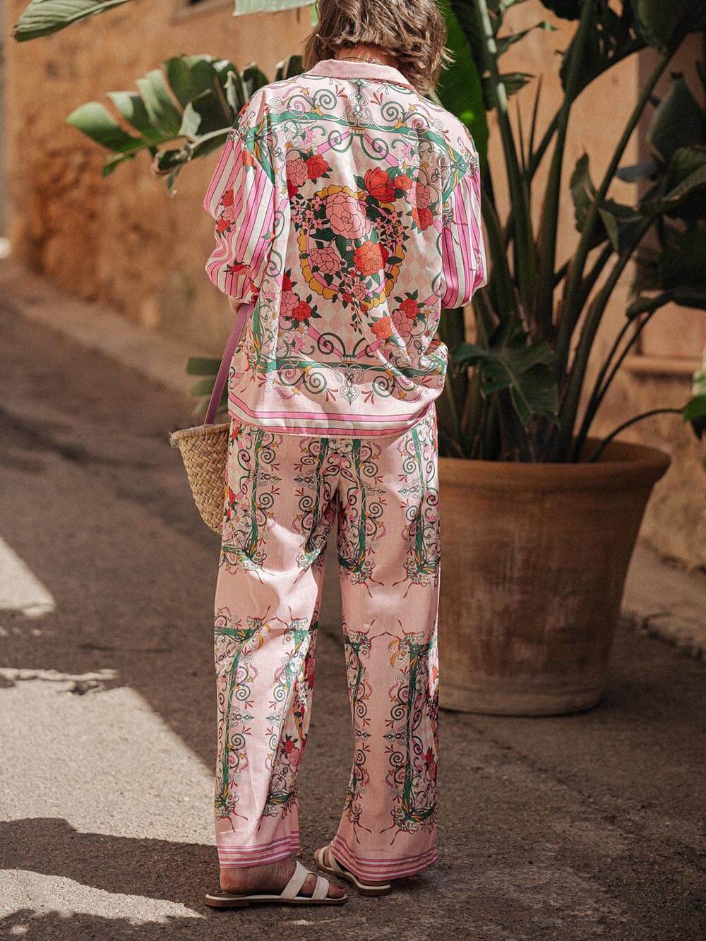 Pantaloni con tasche, vita elasticizzata e stampa floreale originale