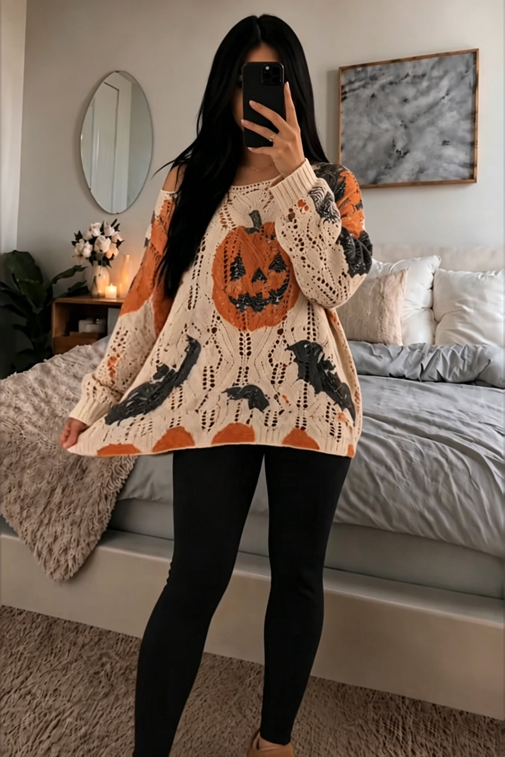 Camisola oversized de malha pointelle com ombros descobertos e estampado de morcegos e abóboras
