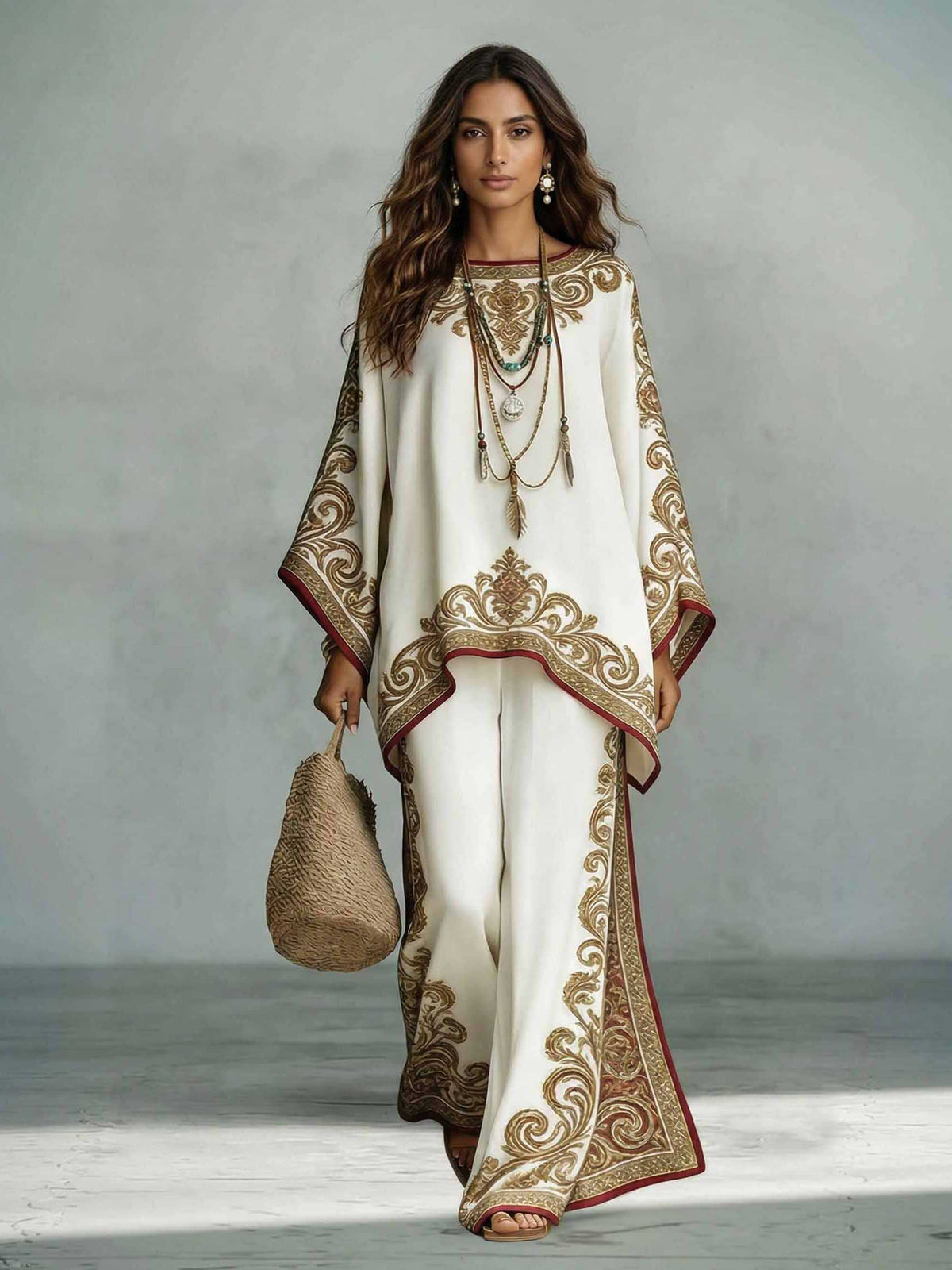 Elegantes zweiteiliges Set aus Oversize-Schultertuch-Oberteil aus bedrucktem Satin und Hose