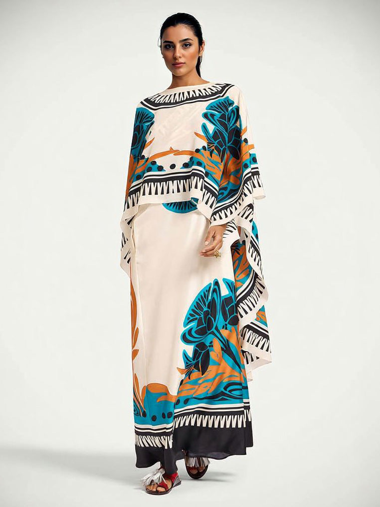 Conjunto requintado de duas peças, com vestido estampado de um ombro e xaile amovível