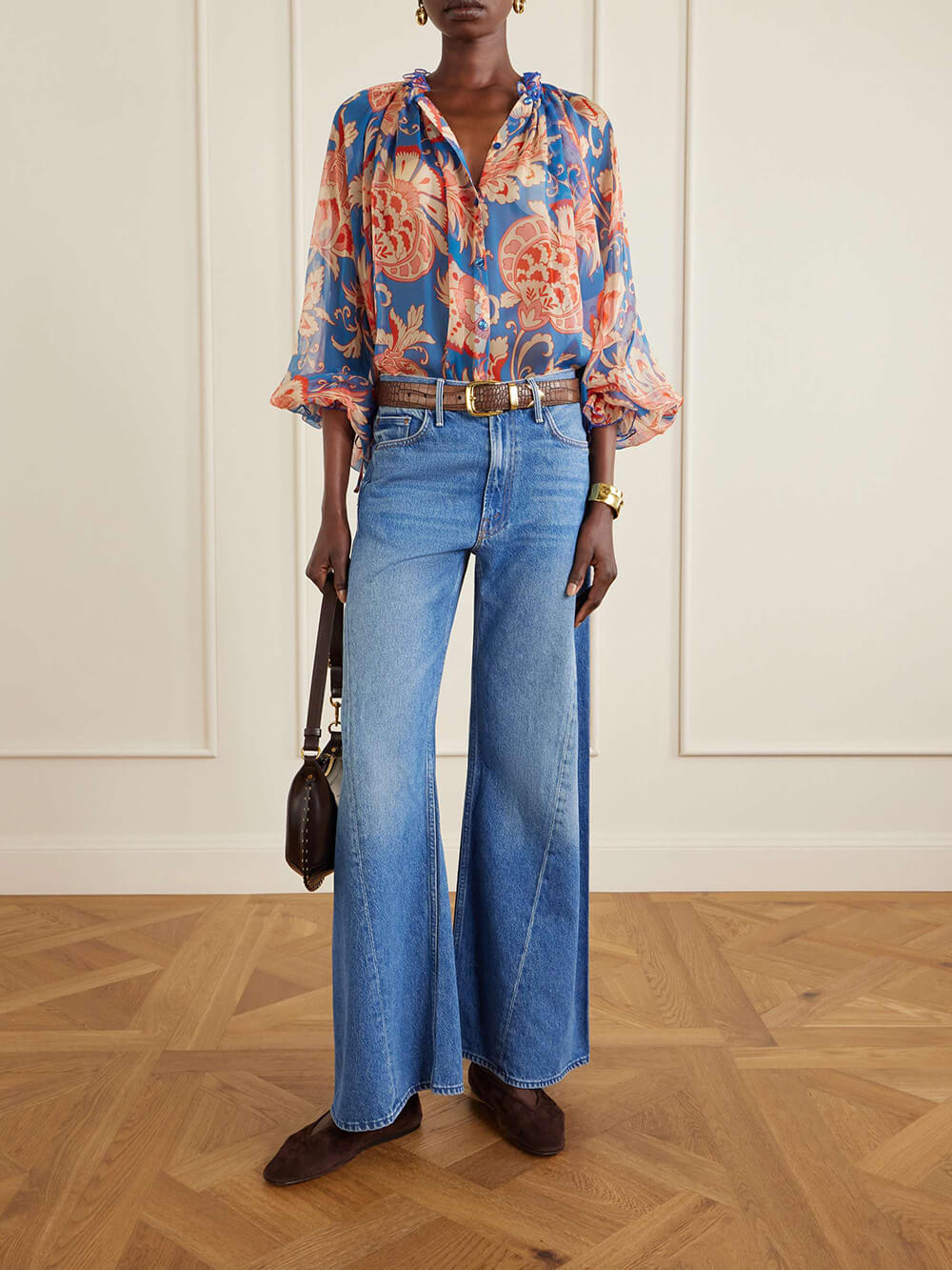 Moderna blusa in chiffon stampato con volant