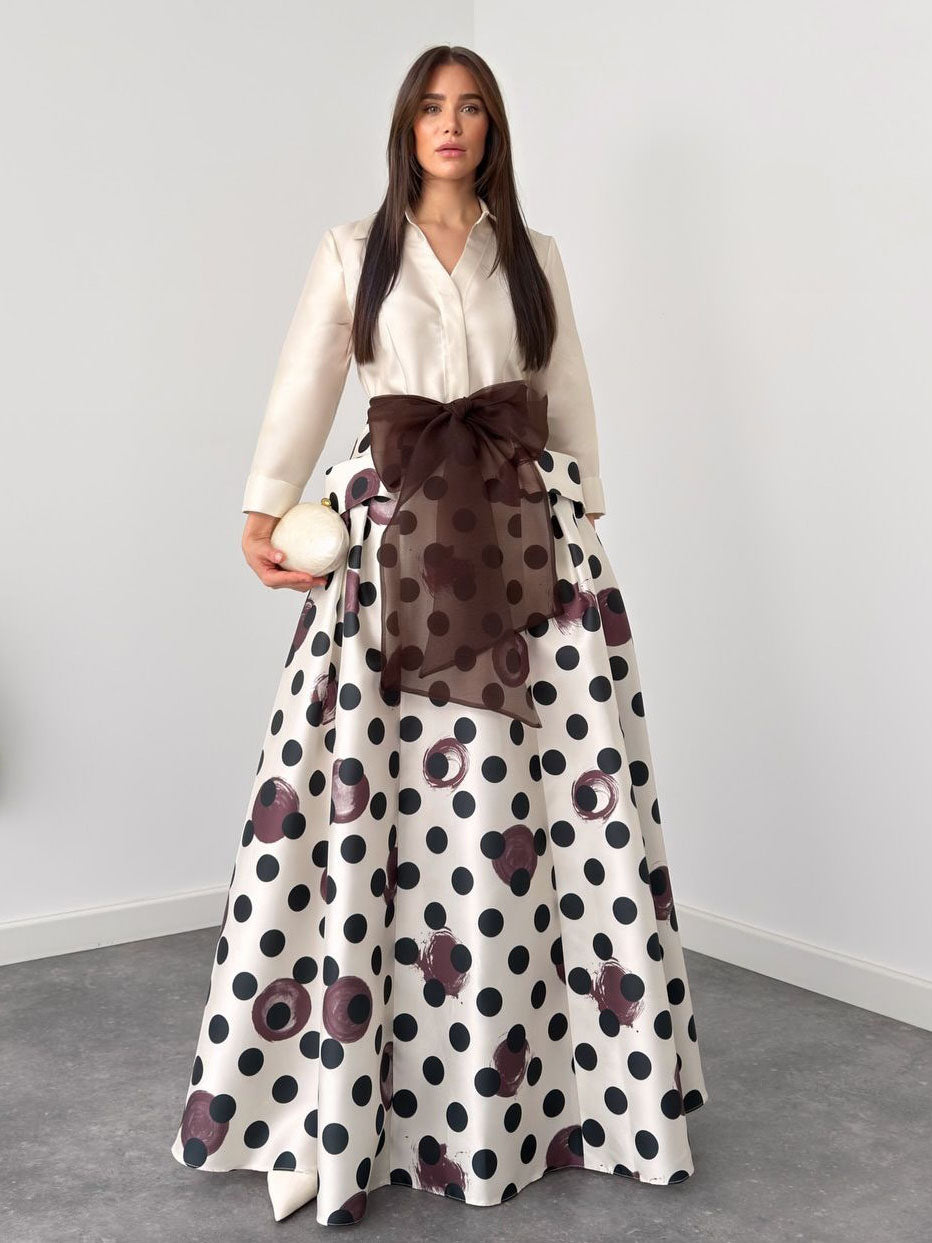 Maxiabito elegante a pois con cintura in vita