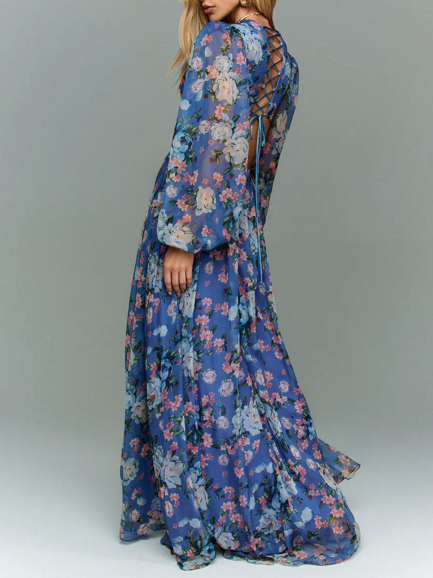 Κομψό μάξι φόρεμα από σιφόν με φλοράλ μοτίβο, άνοιγμα στη μέση και μακριά μανίκια