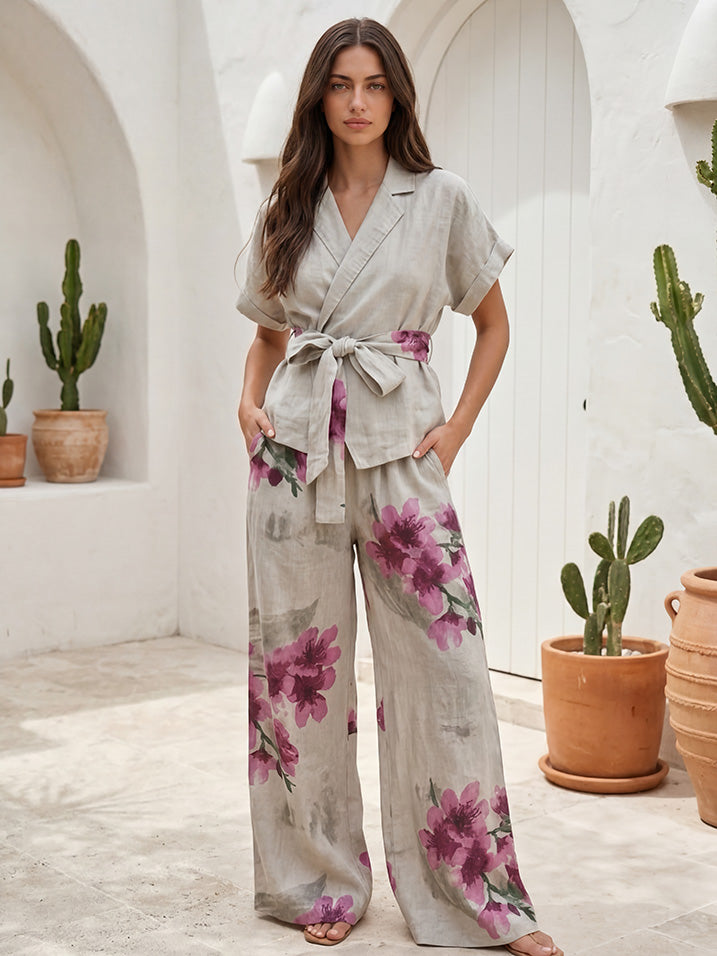Completo casual a due pezzi con top a portafoglio e pantaloni a gamba larga con stampa floreale