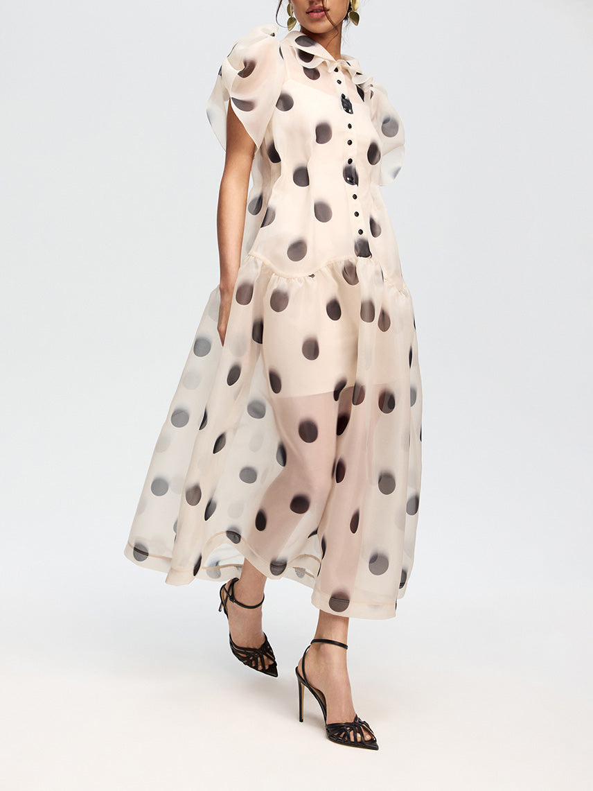 Elegantes Midikleid aus Organza mit Punkten und Puffärmeln