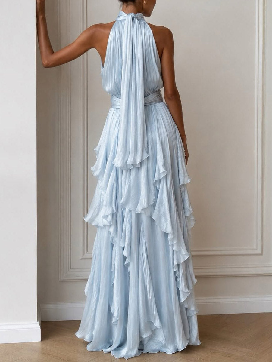 Vestido largo elegante con espalda descubierta, frunces y volantes en capas