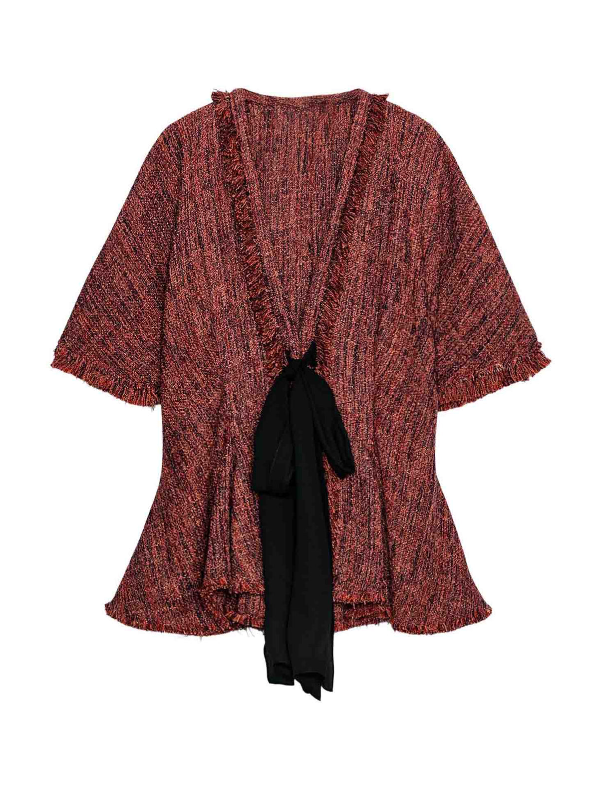 Conjunto de duas peças, com top de tweed com peplum e calções pretos