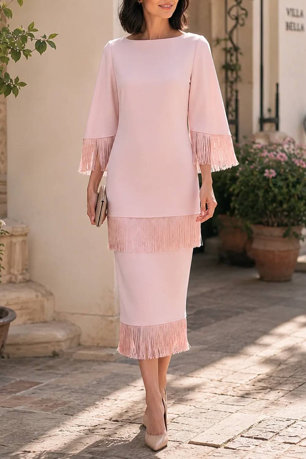 Vestido de largo medio con mangas con flecos
