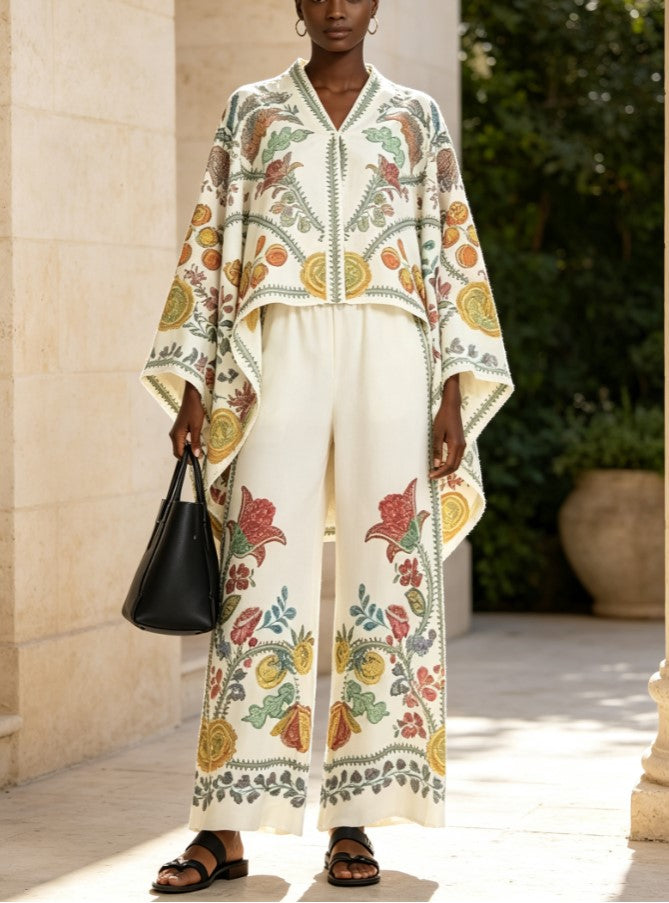 Completo due pezzi vintage con top a mantella a V con stampa floreale e pantaloni a gamba larga