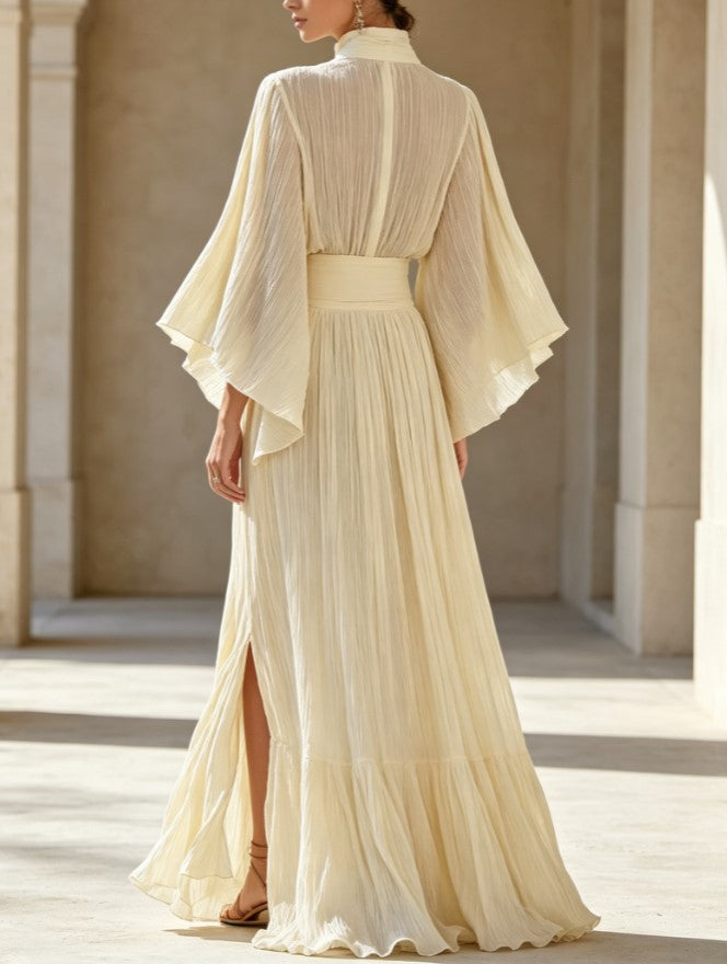 Robe longue deux pièces à col volanté, manches cloche, taille haute plissée et fente
