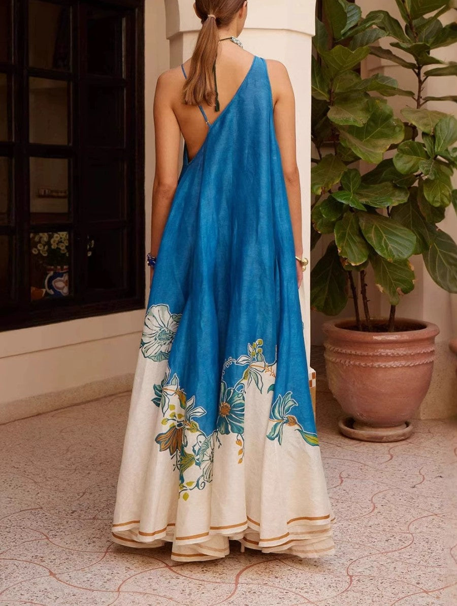 Vestido largo asimétrico con tirante, estampado floral y ribete de volantes, ideal para vacaciones bohemias