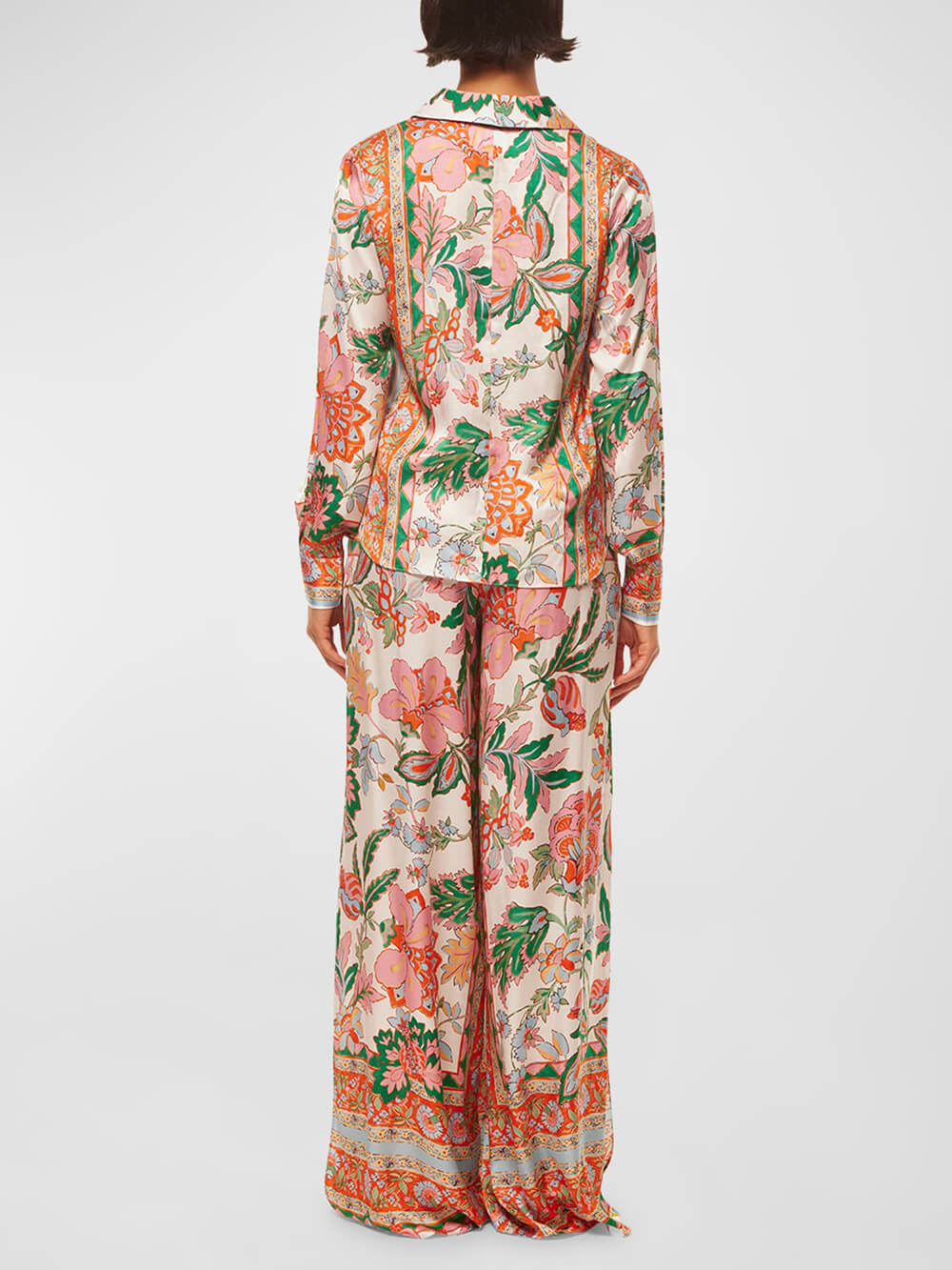 Calças de perna larga com estampado floral original e punhos com racha
