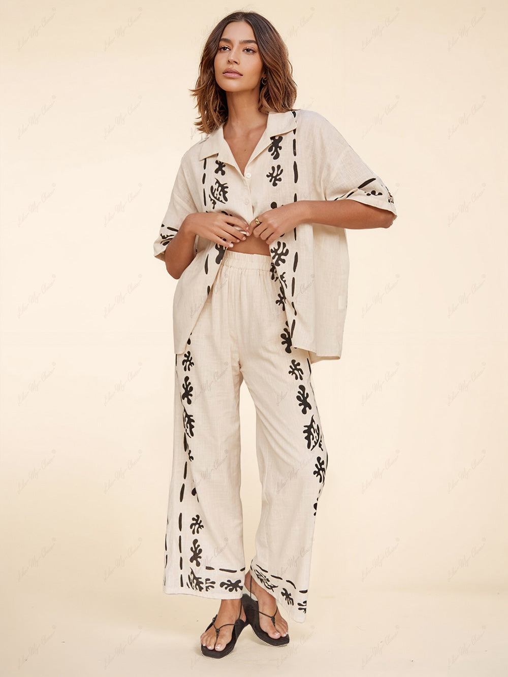Schwarze bedruckte Hose mit weitem Bein in Creme